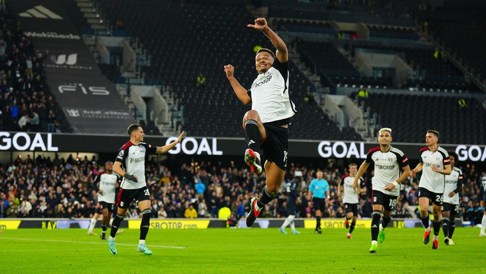 Fulham striker Rodrigo Muniz leaps in celebration after scoring against Tottenham Hotspur