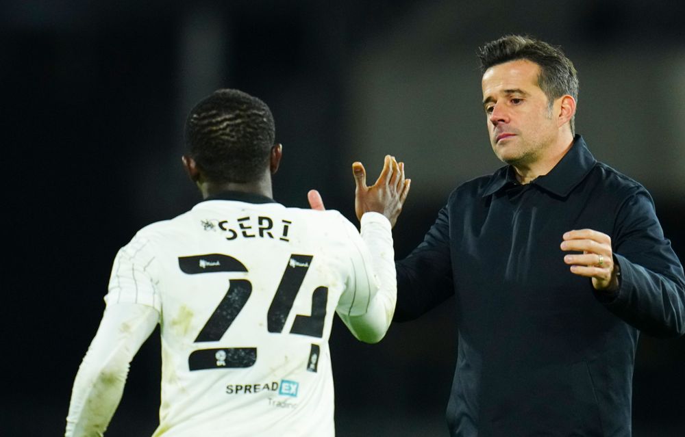 Marco Silva high fives Mika at full time