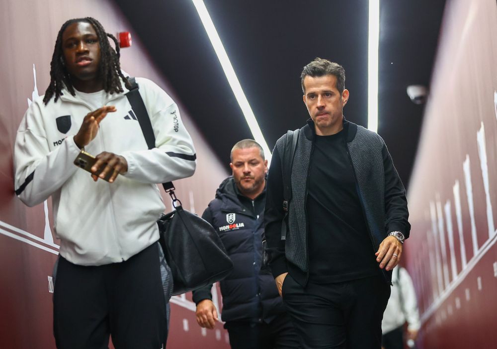 Marco Silva walks alongside Calvin Bassey in the tunnel at Villa Park Marco Silva walks alongside Calvin Bassey in the tunnel at Villa Park