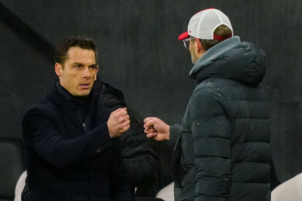 Scott Parker fist bumps Jurgen Klopp following Fulham's 1-1 draw with Liverpool Scott Parker fist bumps Jurgen Klopp following Fulham's 1-1 draw with Liverpool