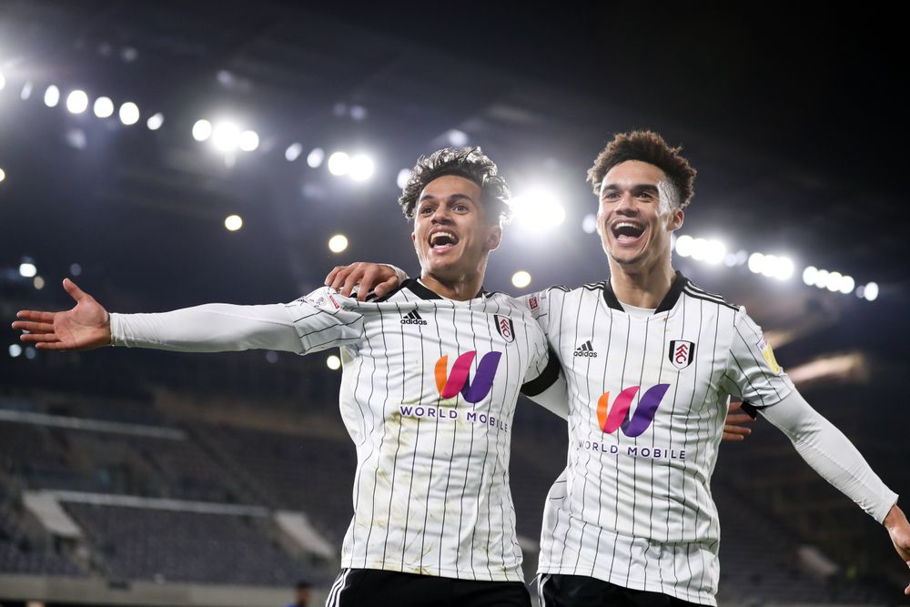 Two of Fulham's goal scorers celebrate
