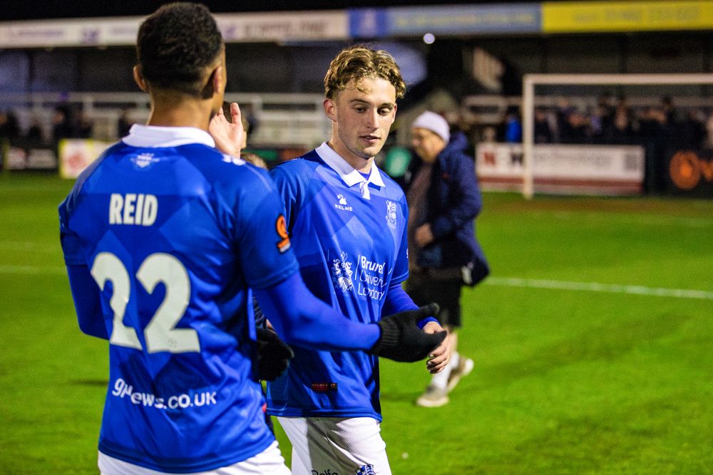 Connor McAvoy celebrates after Wealdstone's win over Boston United