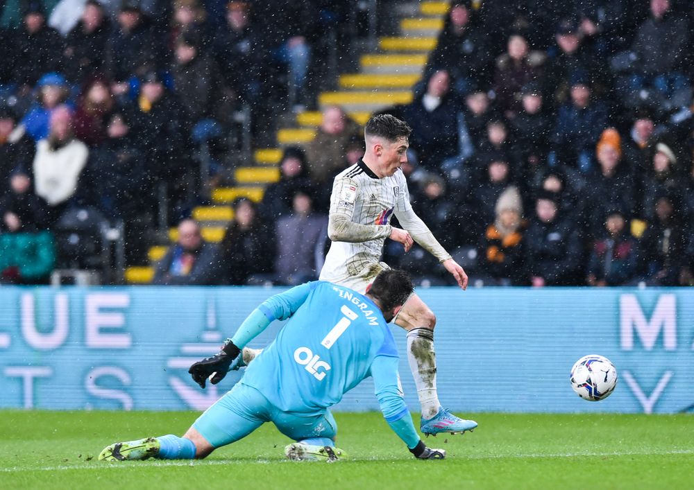 Harry Wilson rounds the 'keeper