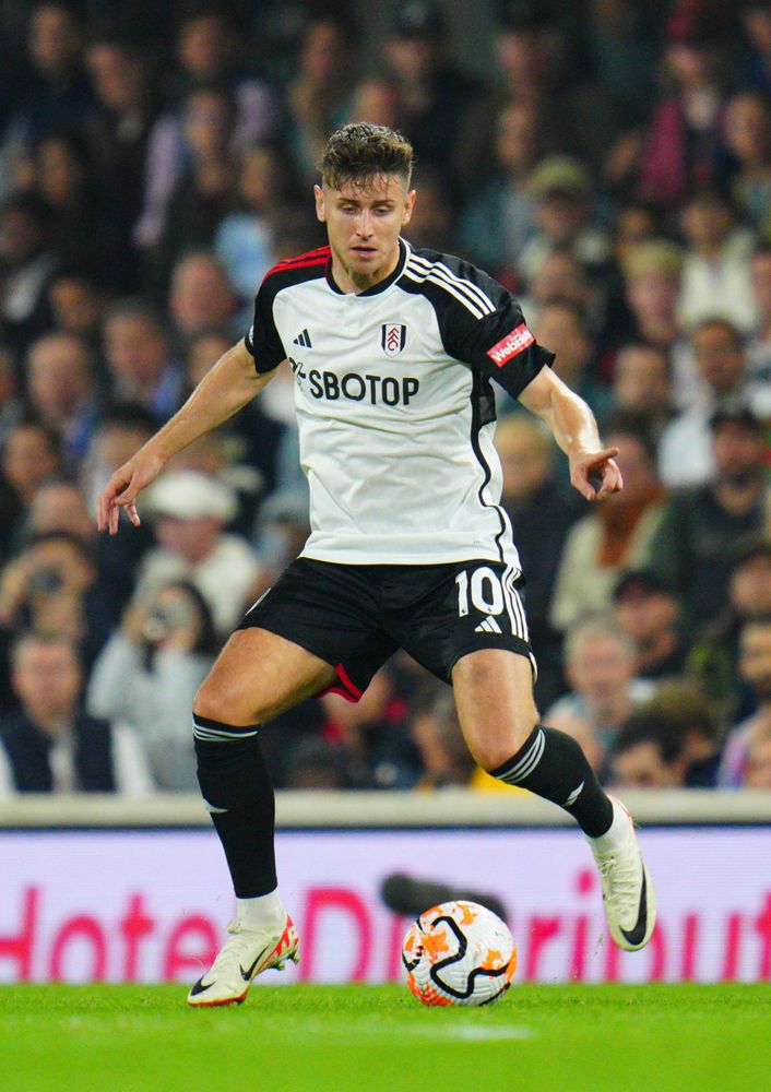 Tom Cairney in action against Chelsea Tom Cairney in action against Chelsea