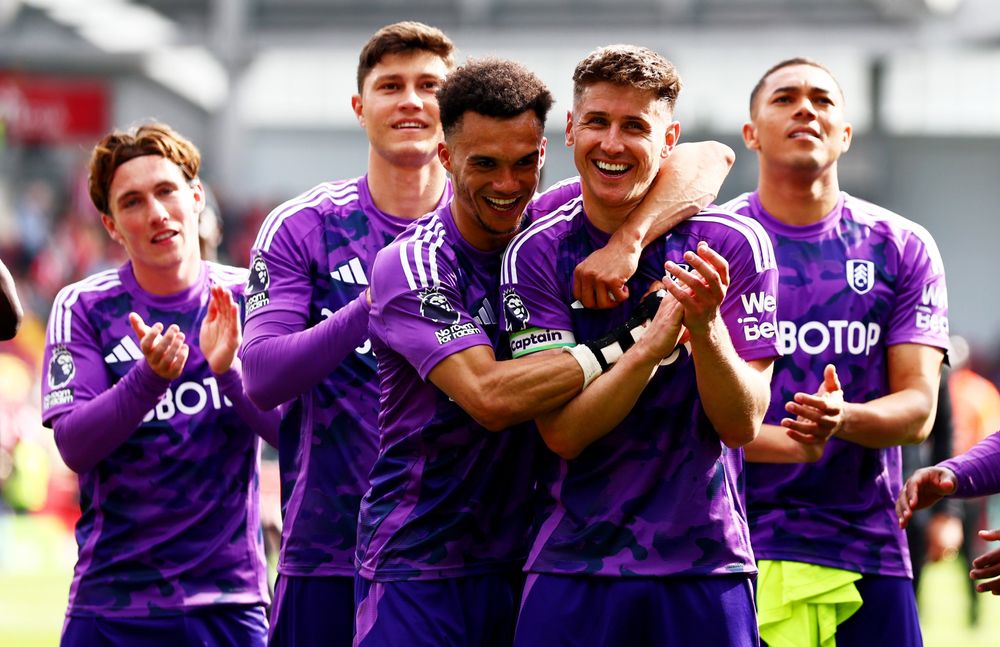 The squad celebrate victory at Brentford The squad celebrate victory at Brentford