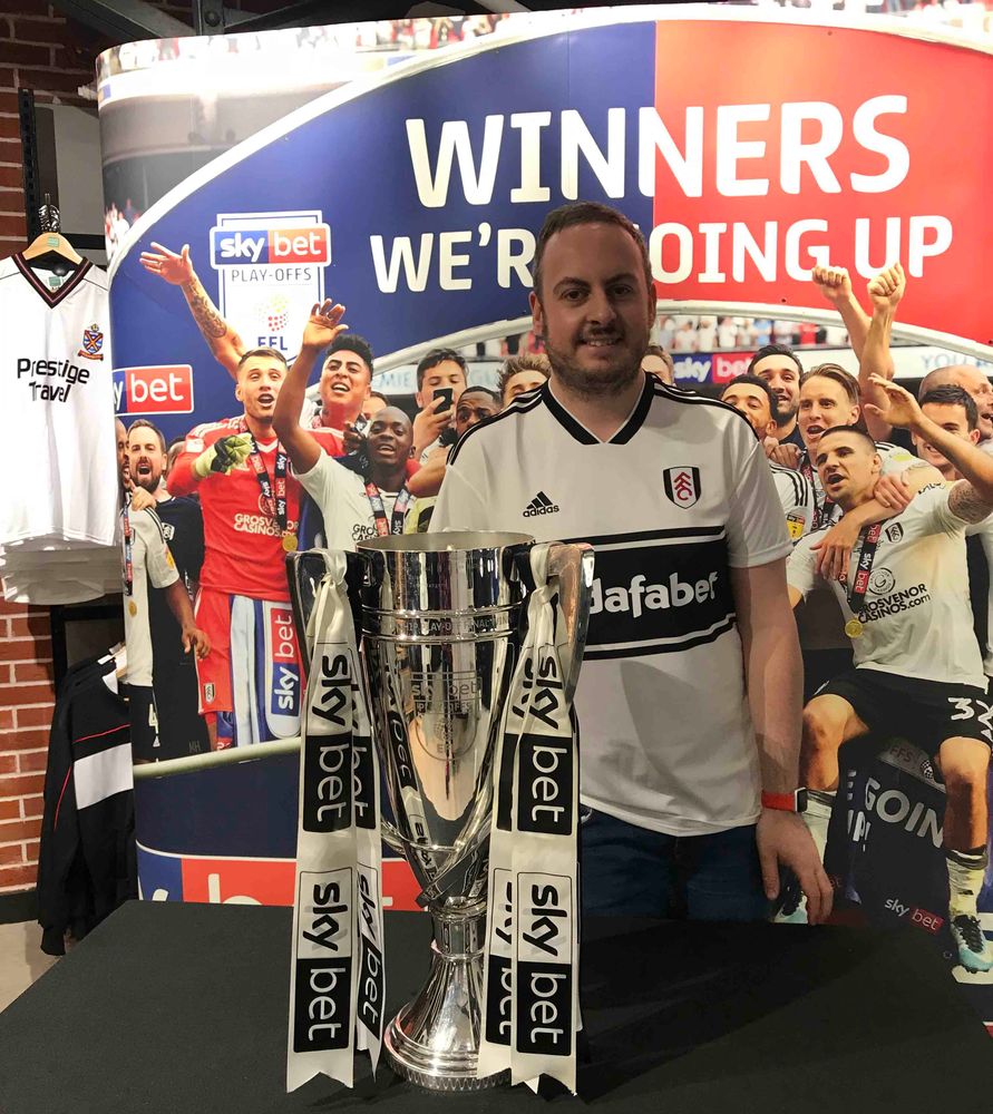 Thomas McIlroy with the Play-Off Final trophy in 2018 Thomas McIlroy with the Play-Off Final trophy in 2018
