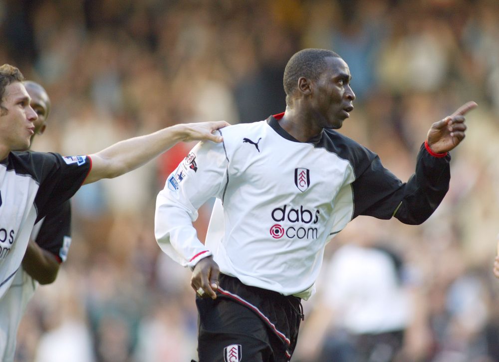 Andrew Cole celebrates scoring for Fulham