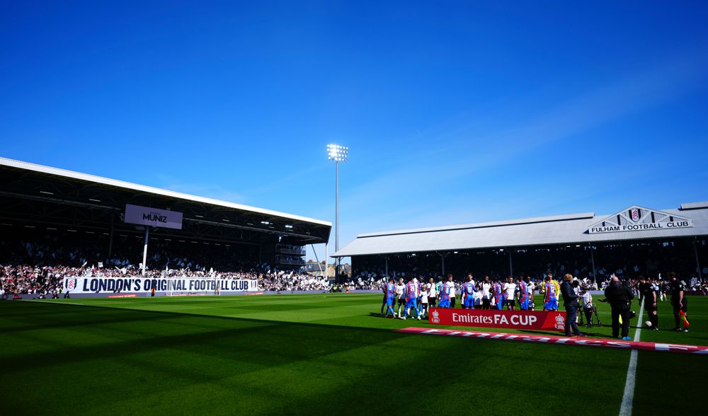 The teams line up pre-match