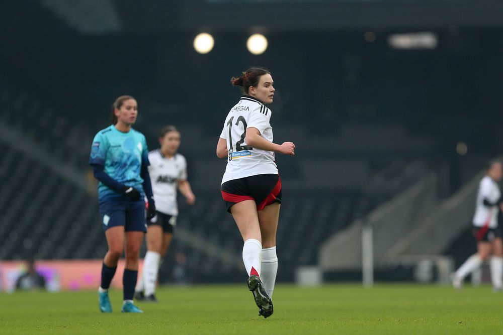 Stella Gandee Morgan in match action Stella Gandee Morgan in match action