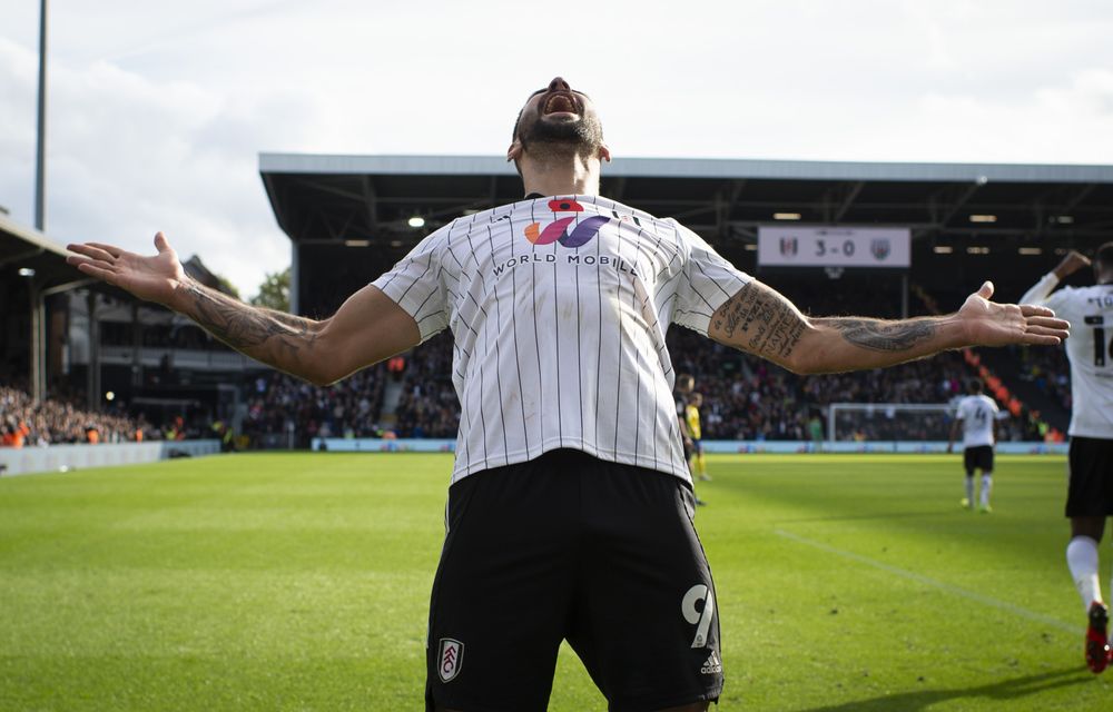 Aleksandar Mitrović celebrates with the Hammy End after securing his hat-trick against West Brom Aleksandar Mitrović celebrates with the Hammy End after securing his hat-trick against West Brom
