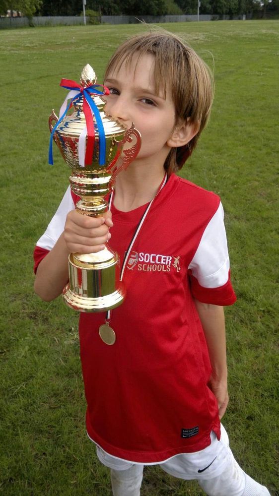 Adrion with some silverware as a young boy Adrion with some silverware as a young boy