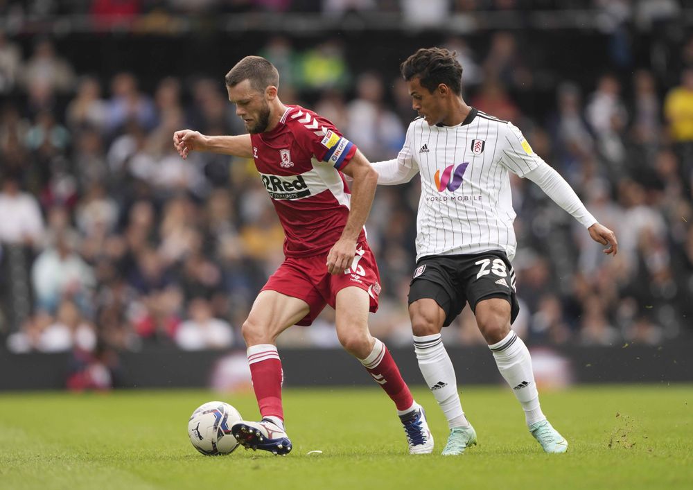 Fabio Carvalho tries to get the ball off Jonny Howson Fabio Carvalho tries to get the ball off Jonny Howson