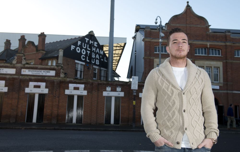 Ross McCormack poses in a cardigan outside Craven Cottage Ross McCormack poses in a cardigan outside Craven Cottage