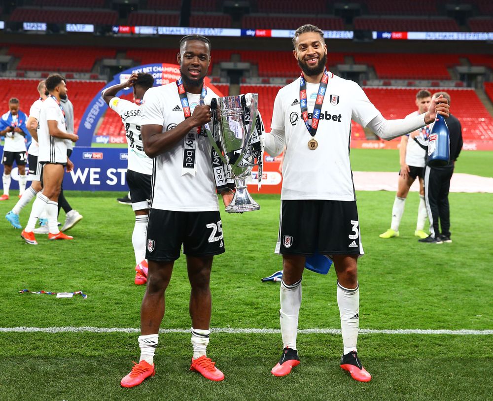 Josh Onomah and Michael Hector celebrate promotion