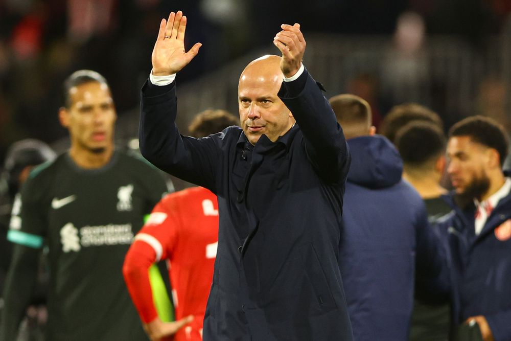 Arne Slot applauds the Liverpool fans after their win in Girona Arne Slot applauds the Liverpool fans after their win in Girona