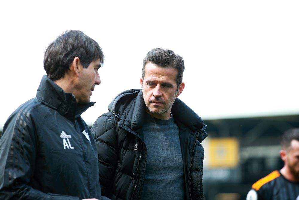 Marco Silva walks across the pitch