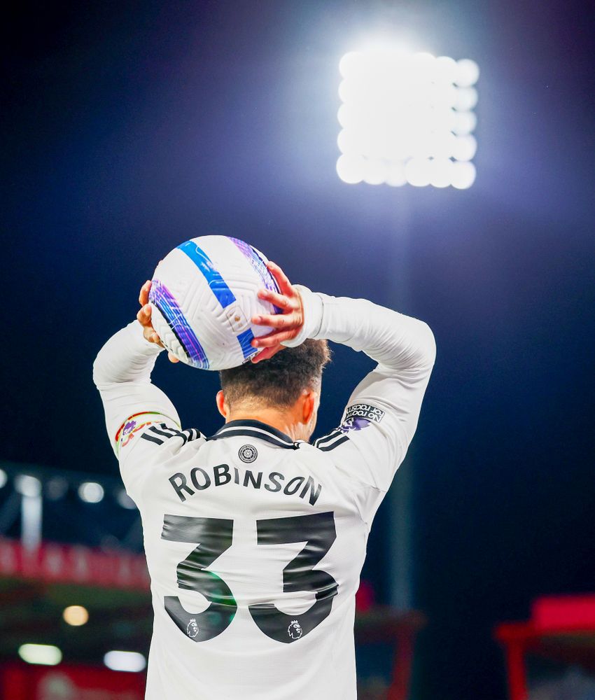 Antonee Robinson takes a throw in for Fulham