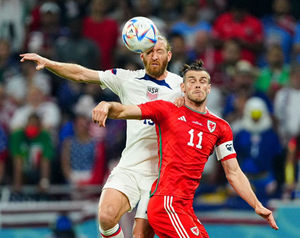 Tim Ream beats Gareth Bale in the air