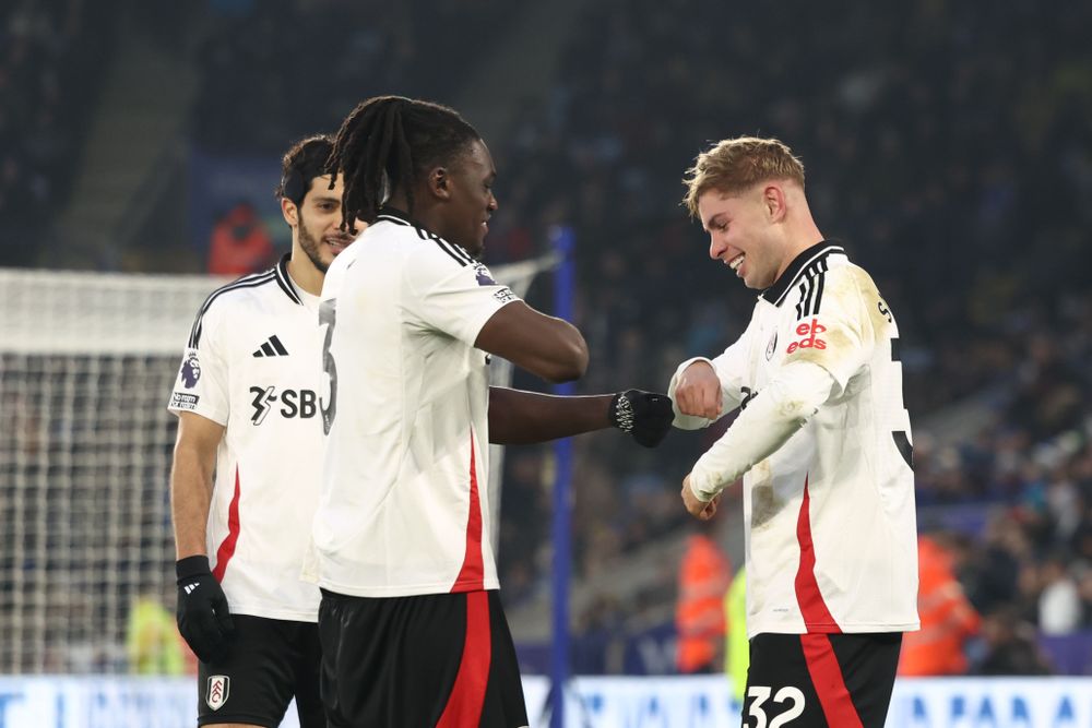 Calvin Bassey and Emile Smith Rowe celebrate the opener