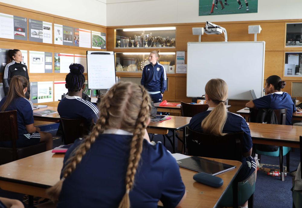 Foundation staff address school pupils