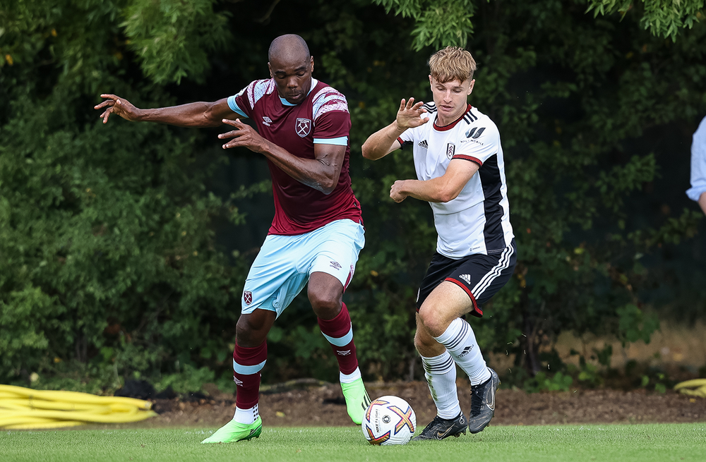 McFarlane races Ogbonna to the ball