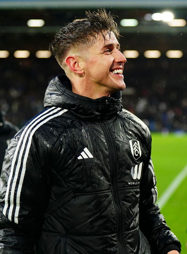 Tom Cairney celebrates after victory over Arsenal