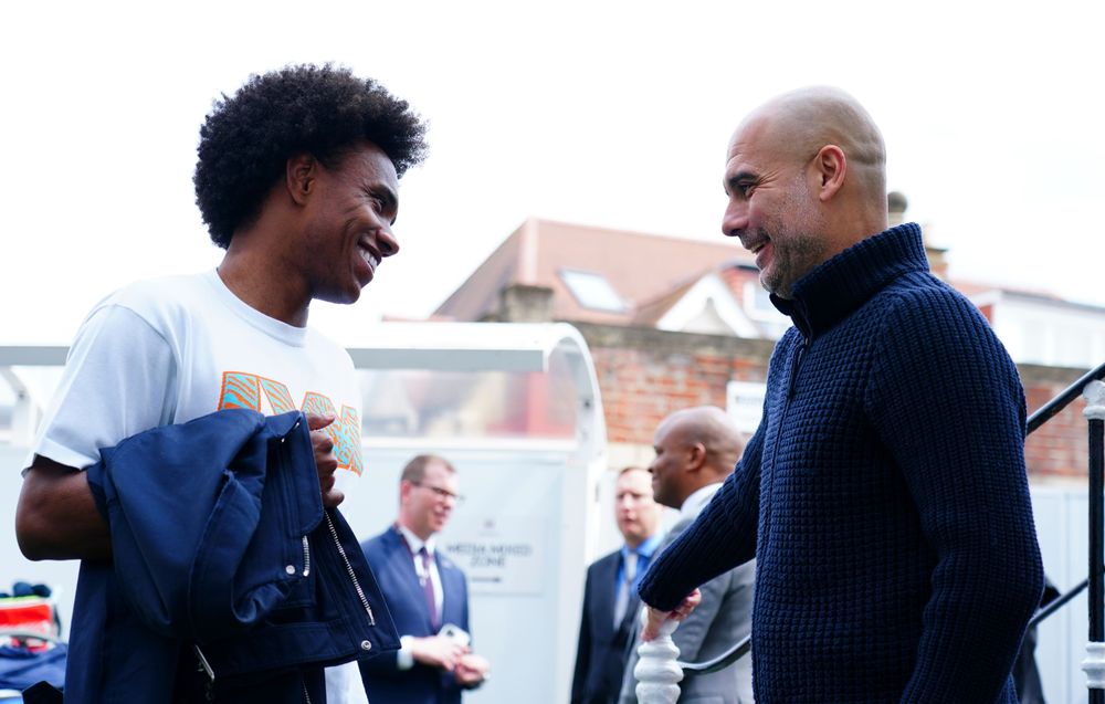 Willian chats to Pep Guardiola before the game Willian chats to Pep Guardiola before the game