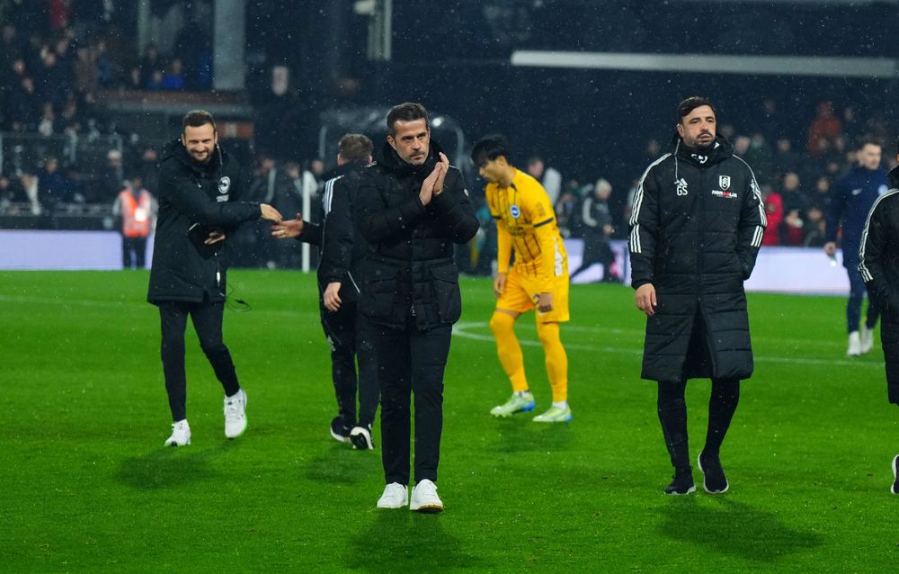 Marco silva applauds fans after Fulham beat Brighton at Craven Cottage