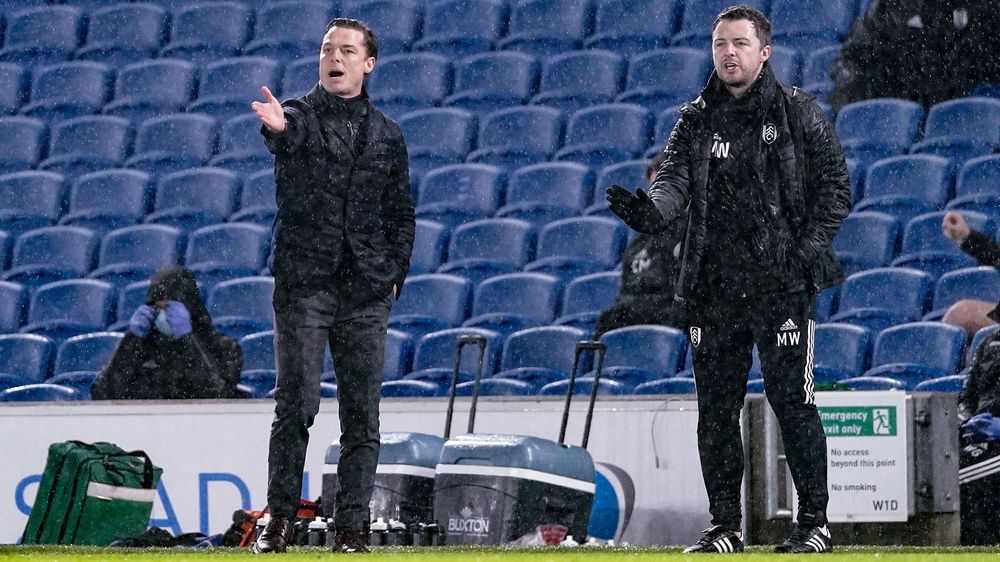 Scott Parker and Matt Wells instruct in the rain