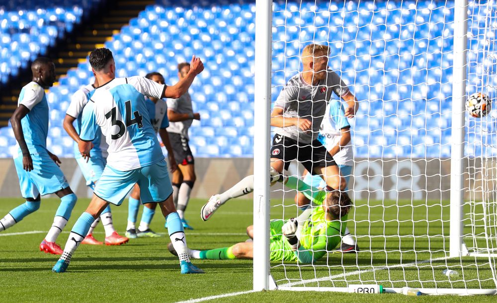 Jayden Stockley bundles the ball in during Charlton's pre-season game with Palace Jayden Stockley bundles the ball in during Charlton's pre-season game with Palace