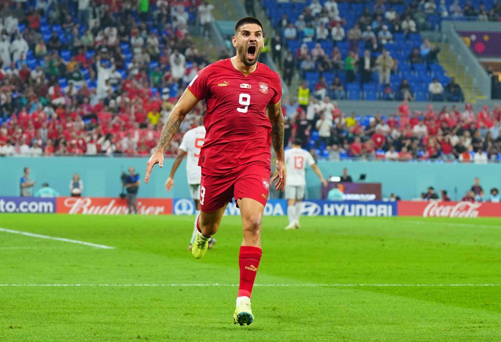 Aleksandar Mitrović celebrates scoring against Switzerland