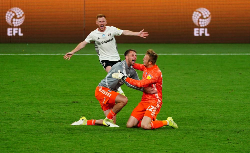 Marcus Bettinelli & Marek Rodák celebrate at full-time