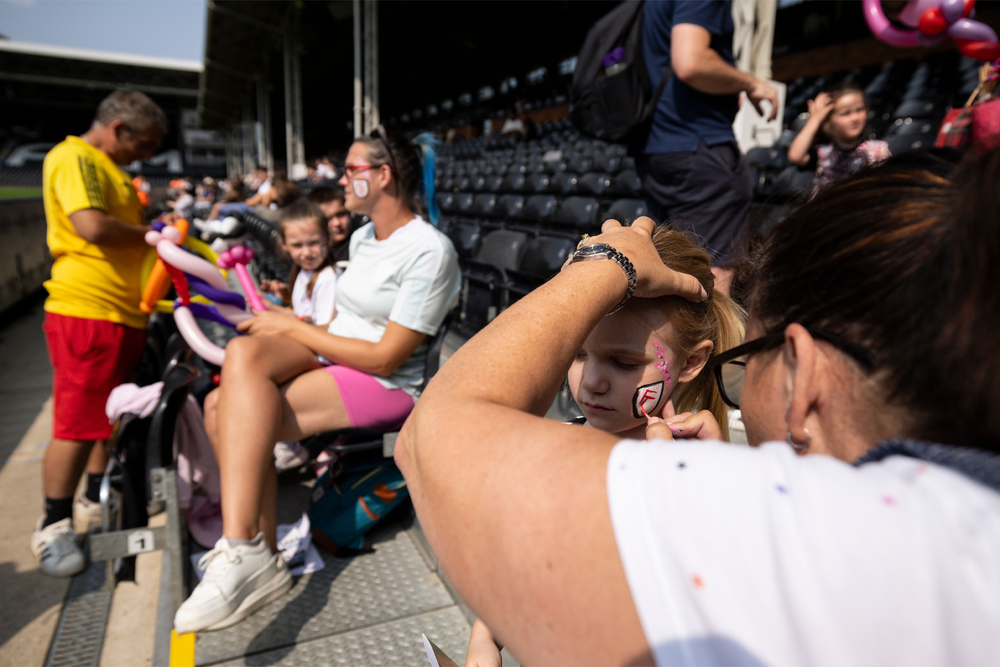 Face Painting in the Johnny Haynes Stand Face Painting in the Johnny Haynes Stand