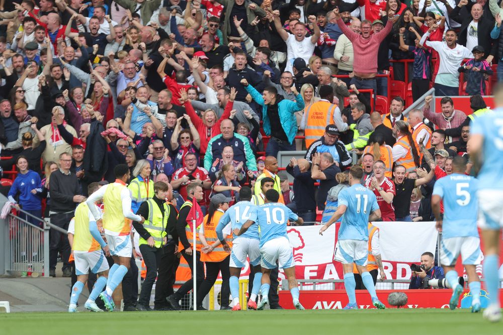Nottingham Forest celebrate their goal at Anfield Nottingham Forest celebrate their goal at Anfield
