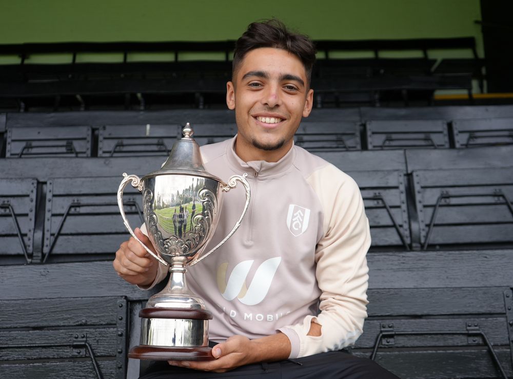 Dibley-Dias holding the trophy Dibley-Dias holding the trophy