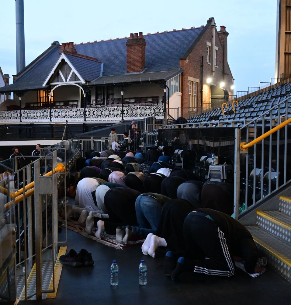 A group prayer in the Putney End