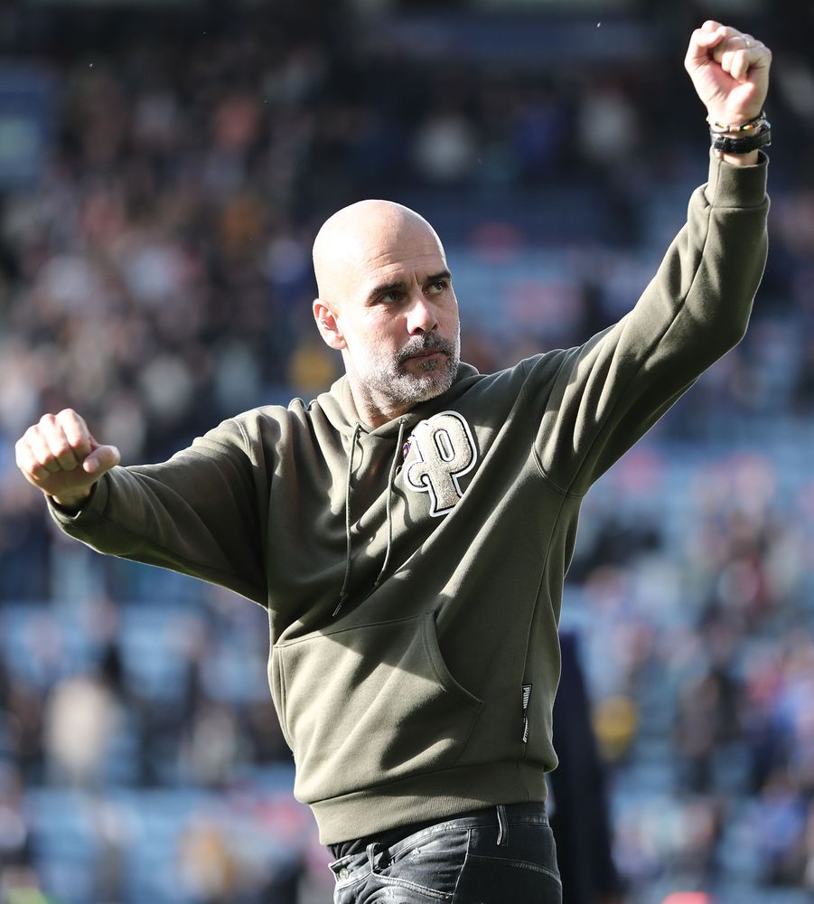 Pep Guardiola acknowledges the Manchester City supporters