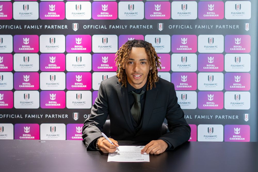 William Sutton-Bangura signs his scholarship agreement