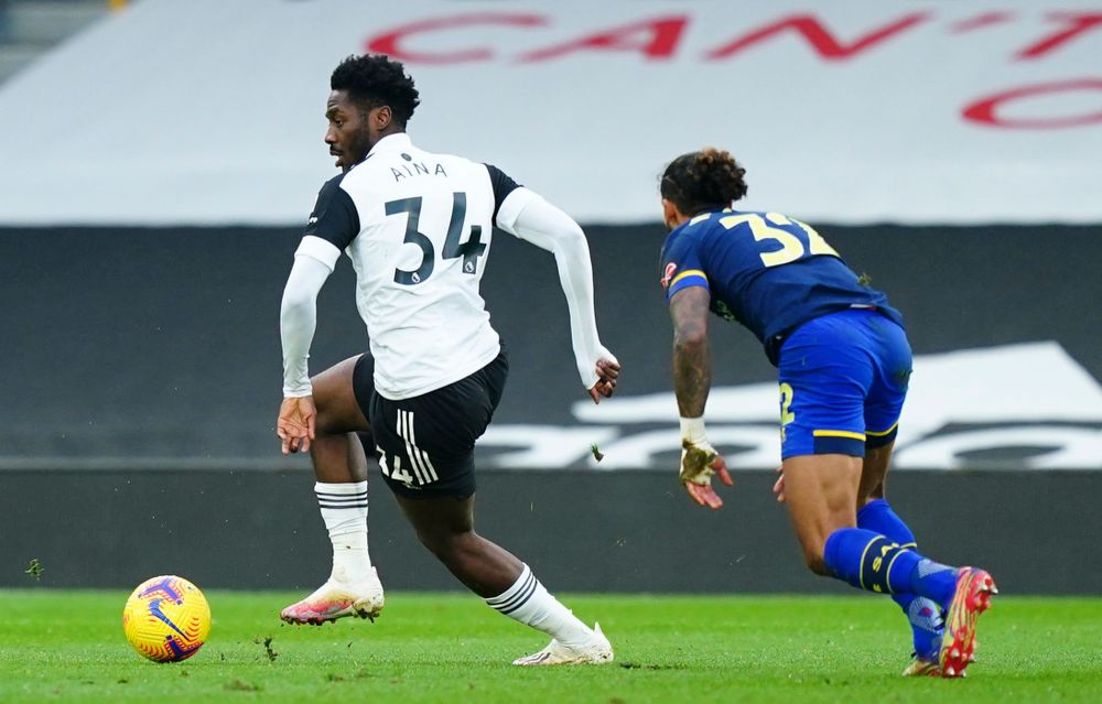 Ola Aina turns away from Southampton's Theo Walcott Ola Aina turns away from Southampton's Theo Walcott