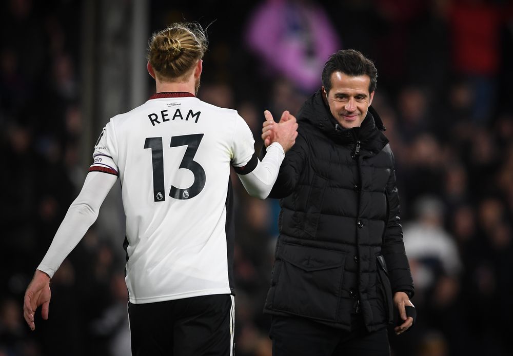 Marco Silva shakes hands with Tim Ream