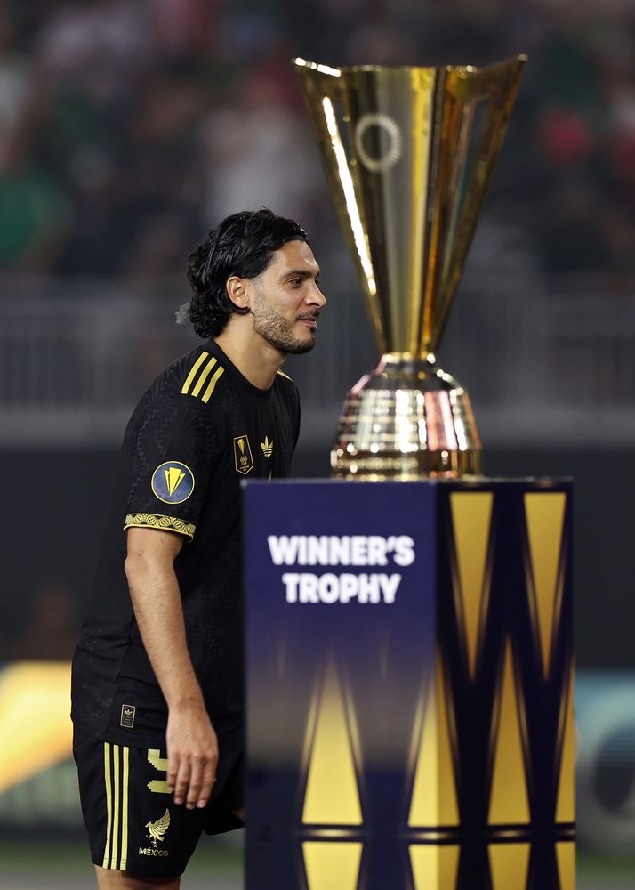 Raul Jimenez gets on stage ahead of the trophy lift