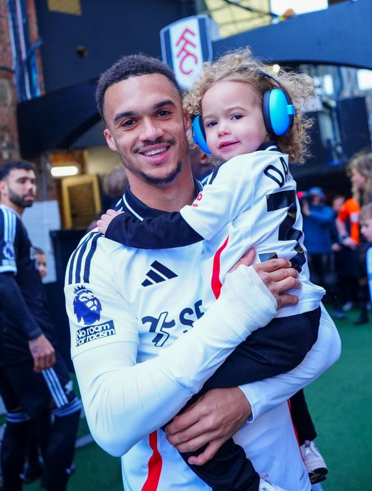 Antonee Robinson with his daughter at Craven Cottage Antonee Robinson with his daughter at Craven Cottage