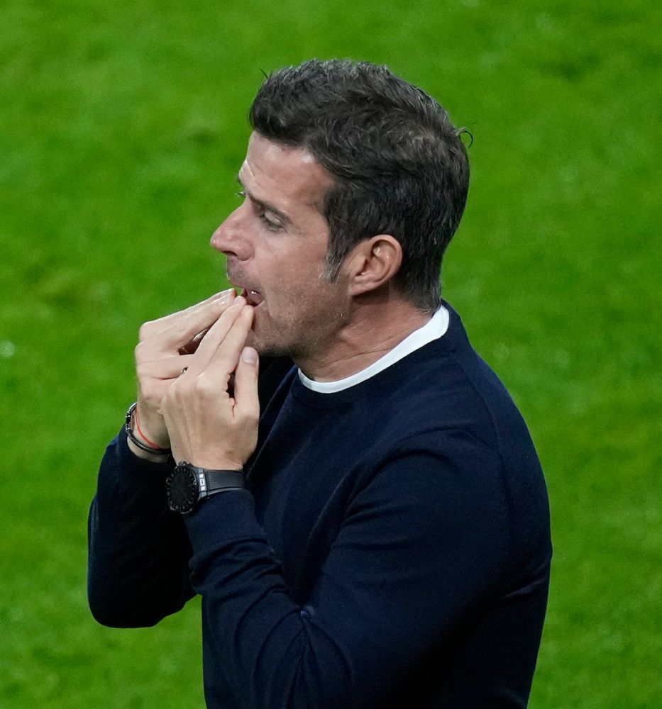 Marco Silva whistles on the touchline Marco Silva whistles on the touchline