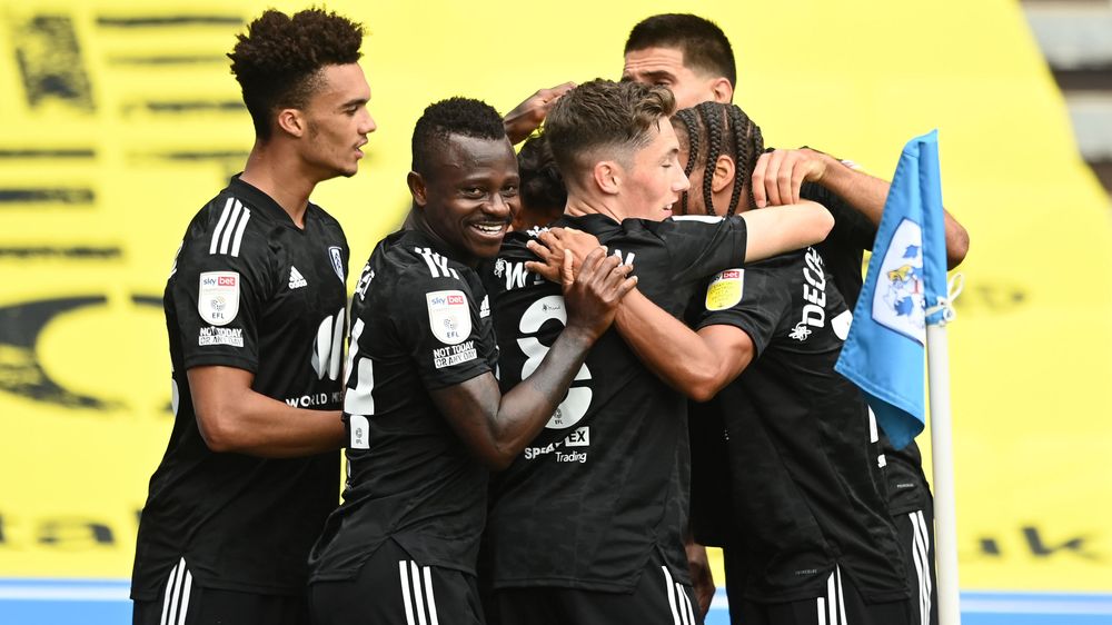 The Fulham players celebrate Fabio Carvalho's goal against Huddersfield Town The Fulham players celebrate Fabio Carvalho's goal against Huddersfield Town