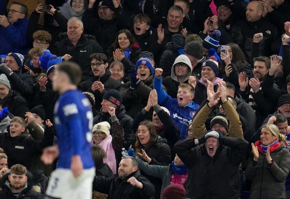 Ipswich Town fans celebrate during the win over Chelsea Ipswich Town fans celebrate during the win over Chelsea