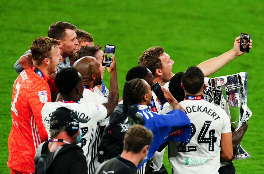 Kevin McDonald and his teammates FaceTime Tony Khan following victory over Brentford at Wembley