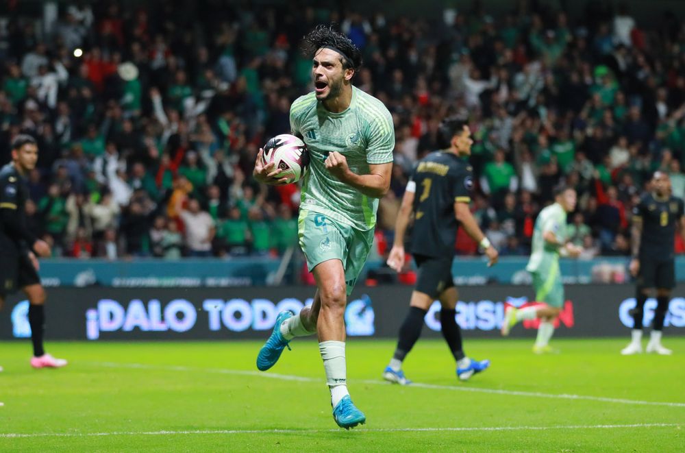 Raul celebrates scoring for Mexico