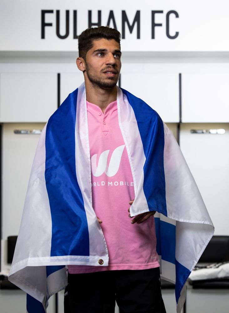 Manor Solomon poses with the Israel flag in the Motspur Park changing room Manor Solomon poses with the Israel flag in the Motspur Park changing room