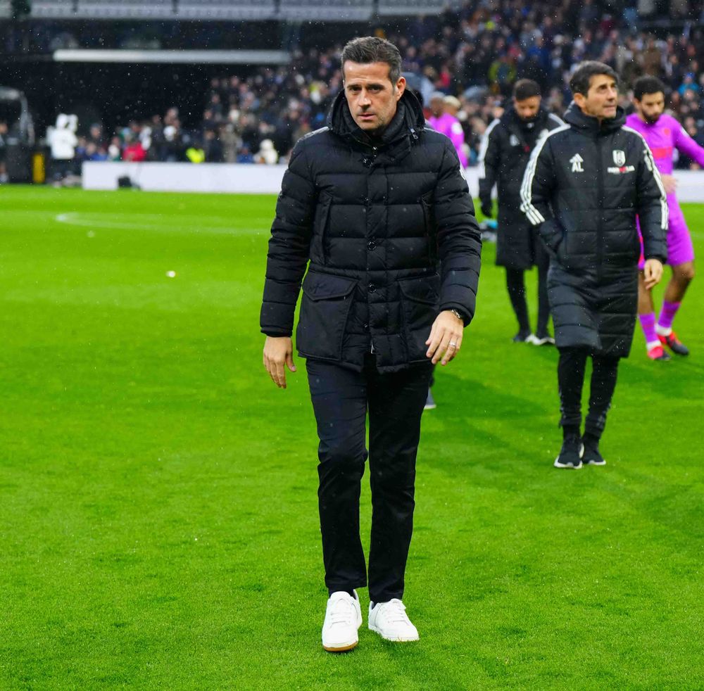 Marco Silva walks across the Cottage pitch Marco Silva walks across the Cottage pitch