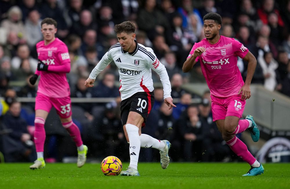 Tom Cairney drives forwards with the ball against Ipswich Town Tom Cairney drives forwards with the ball against Ipswich Town